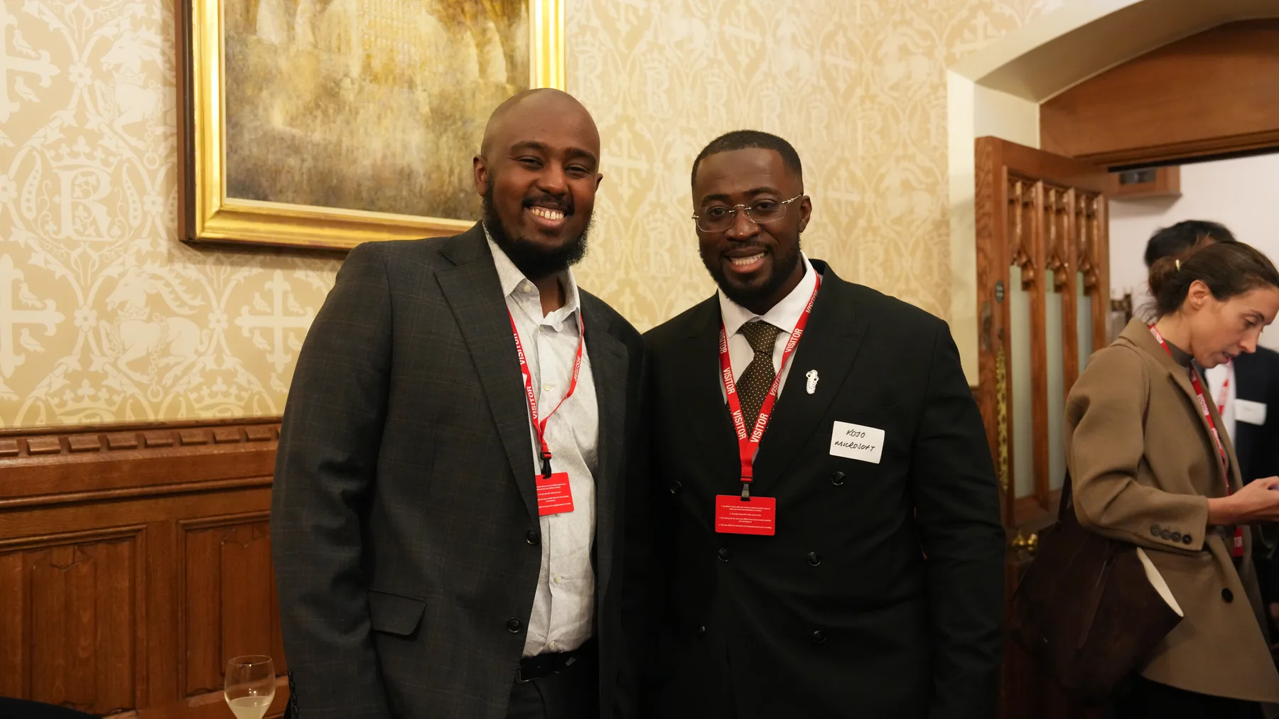 Two attendees posing together at the House of Lords