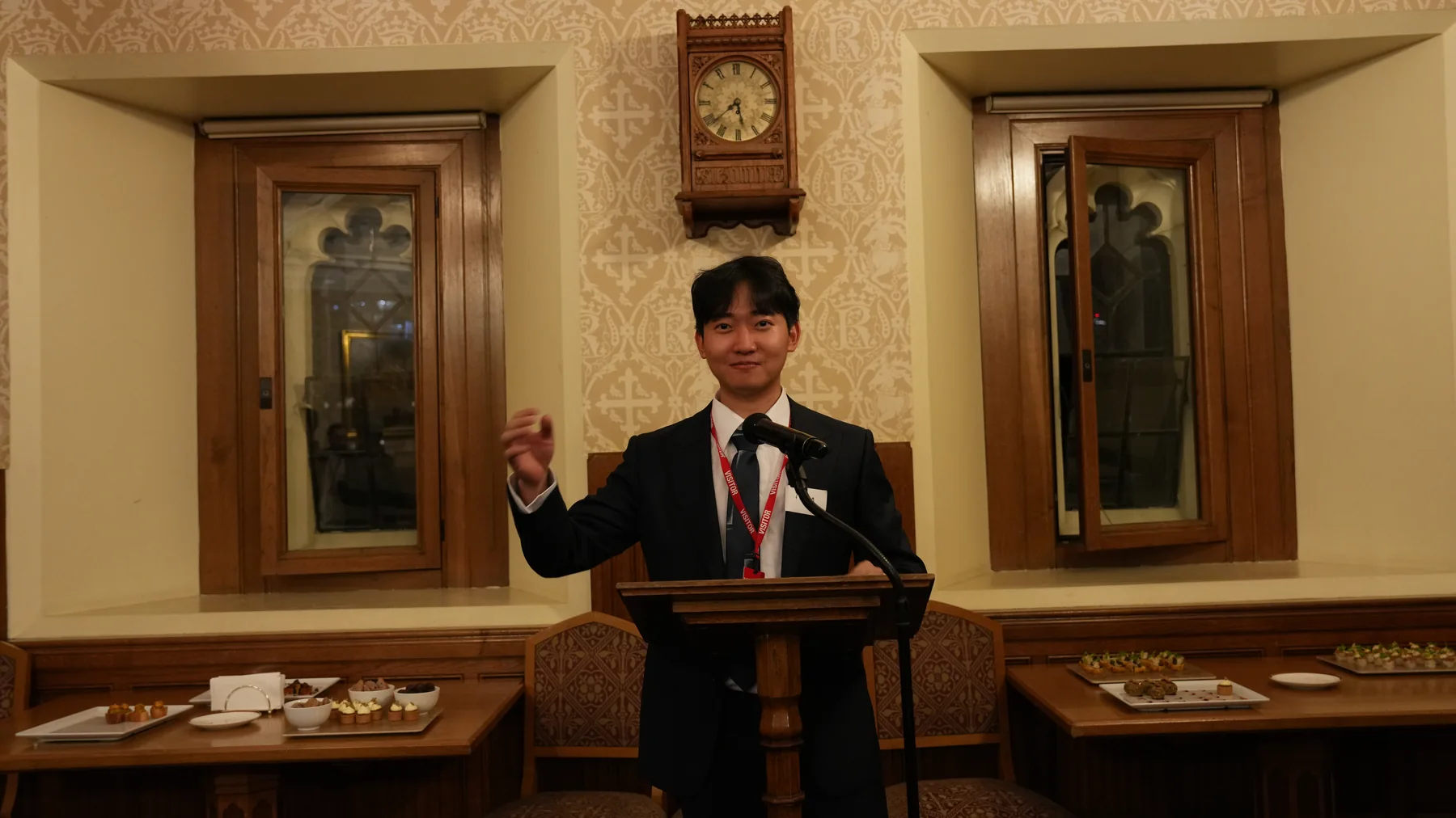 Speaker gesturing from the lectern during a House of Lords talk