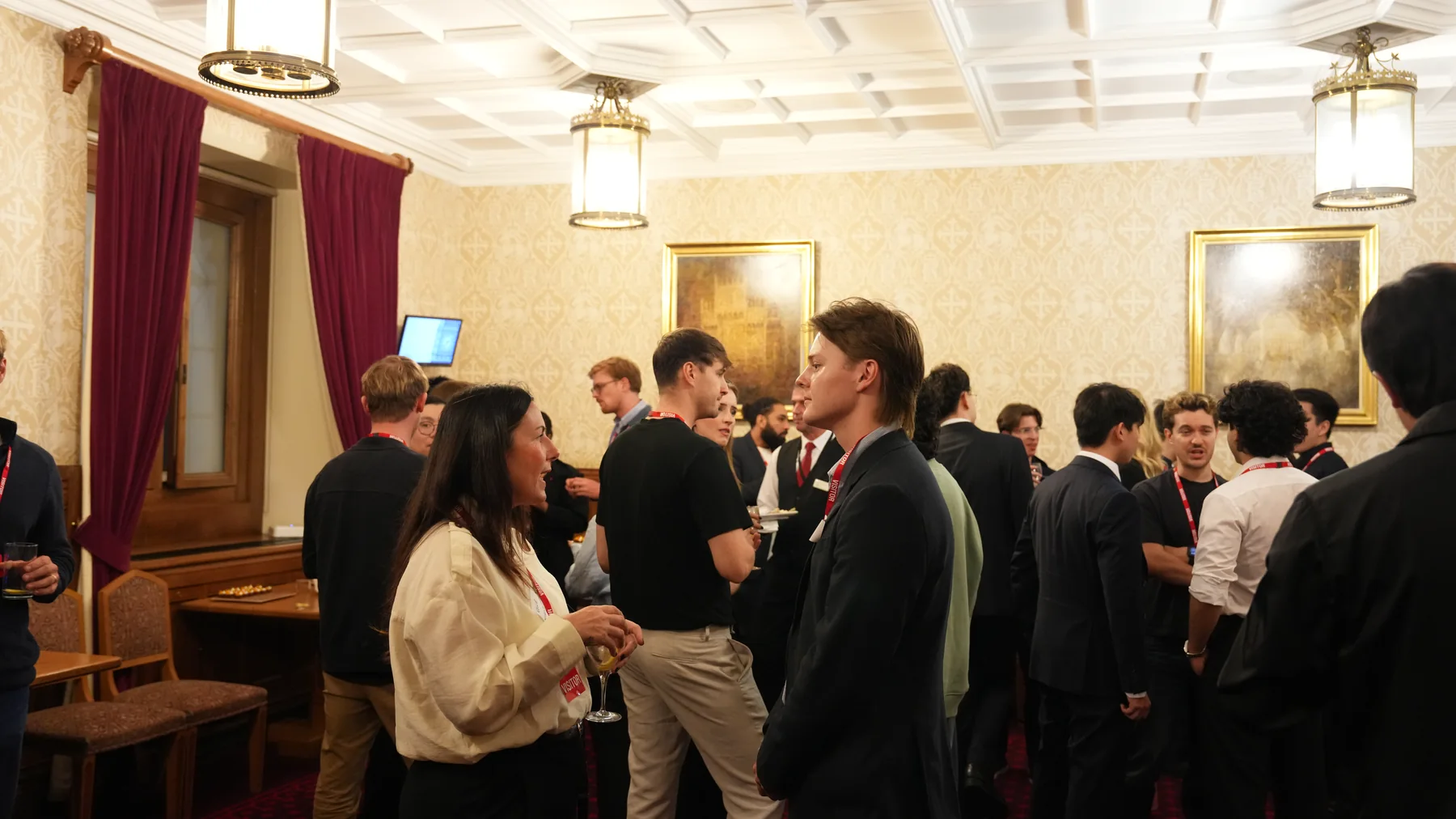 Guests networking across the House of Lords reception room